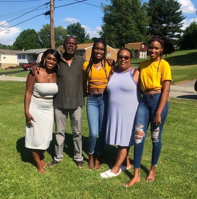 Rochelle (right) with her cousin, uncle, sister, and aunt.