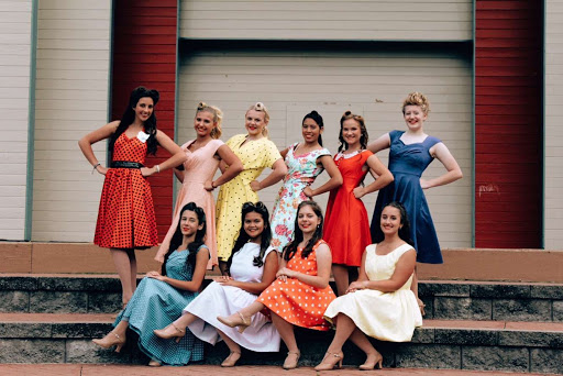 The girls in Dancing Through the Decades dress in 1940s fashion