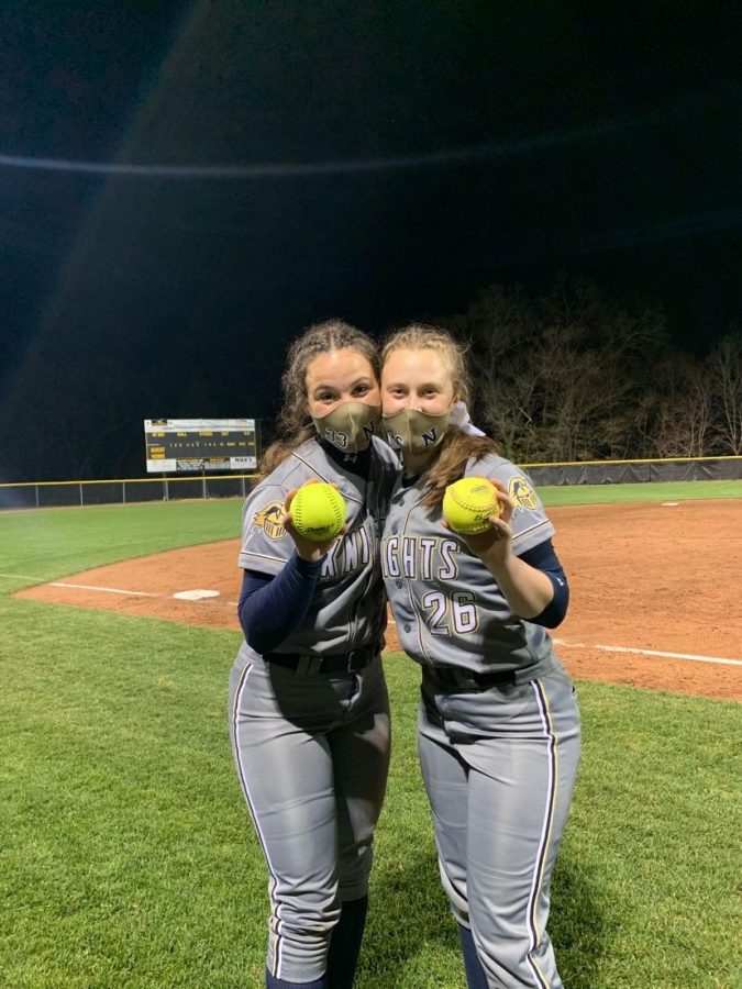 Sydney Lokay and Madie Kessler pose with their home run balls.