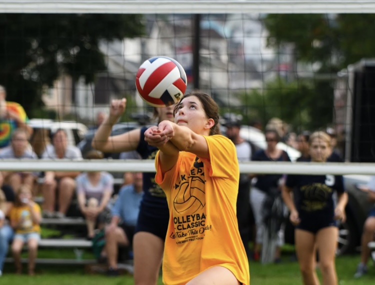 Grace Shephard sets up one of her hitters for a kill in the outdoor game against Kiski Area