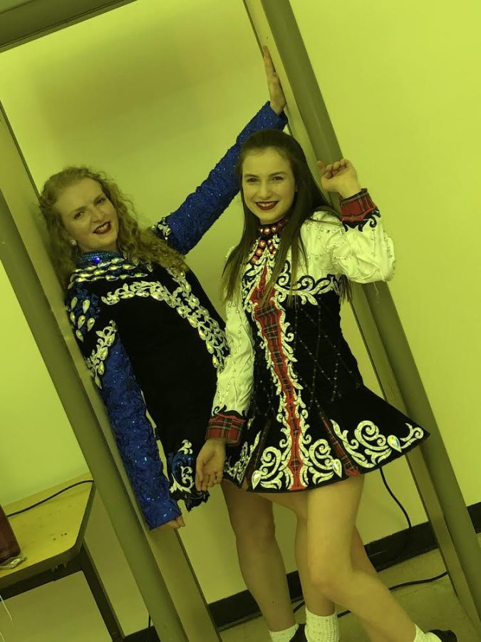 Mackenzie and Olivia Lane posing after performing at Pittsburgh Science and Technology Academy