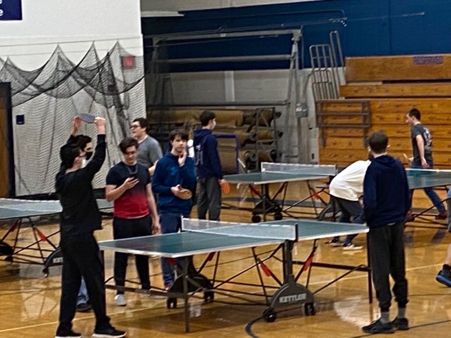 Norwin students engage in an intense game of table tennis at one of the club’s meetings.