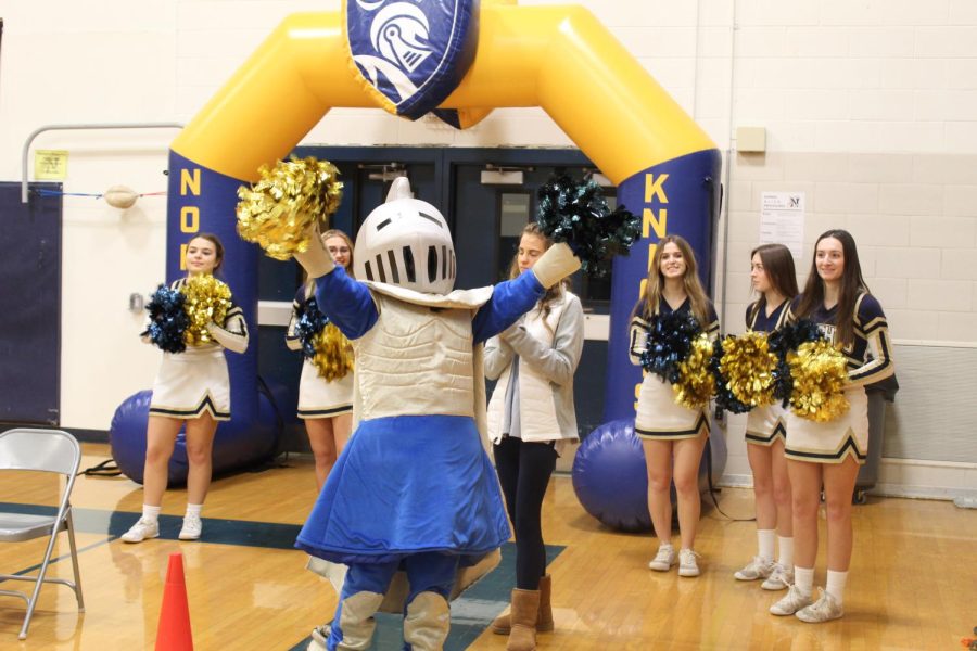 The Knights mascot gets the crowd energized for the game.