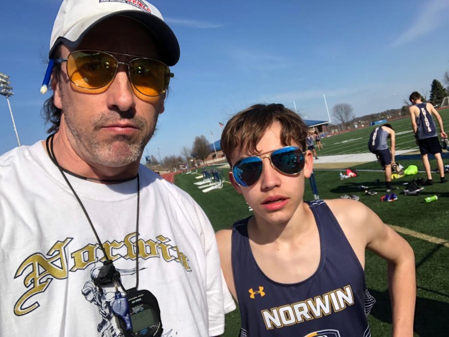 Mario Breauchy stands with track/griddy coach Brian Fleckenstein after a 8x100 meter griddy workout.