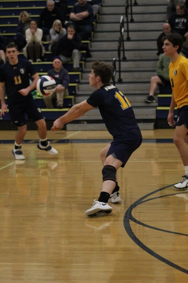 Troy Horvath passes the ball to his setter off of a serve against Seneca Valley.