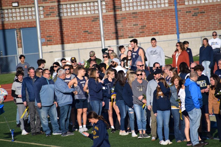 The track team and their parents gather for Senior Night on Wednesday, April 20.