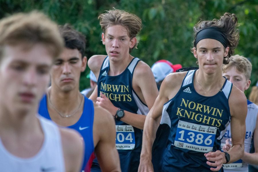 Junior Noah Wilson (left) and senior Andres Breauchy (right) lead the Knights at the Red, White, and Blue Invitational on Sept. 10.