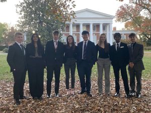 Norwin students Andrew Brown (11), Harneet Singh (10), Oliver Hinson (12), Molly Geissler (10), Rex Wu (11), Norwin Student (12), David Shepherd (11), and Brady Johnson (12) get ready for their UVA conference