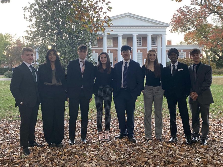 Norwin students Andrew Brown (11), Harneet Singh (10), Oliver Hinson (12), Molly Geissler (10), Rex Wu (11), Maleah Phetsomphou (12), David Shepherd (11), and Brady Johnson (12) get ready for their UVA conference