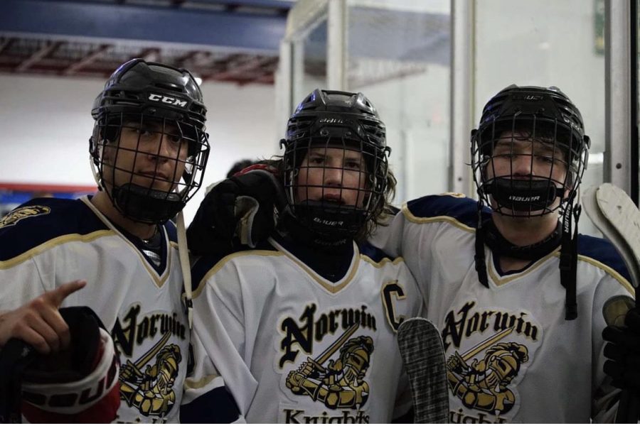 Teammates Joey Vecchio ,(Left) Captain Alex Thomas, (Center) and Mario Cavallaro (Right) pose for a picture after their 7-1 win against Shaler. (@norwinhockey on IG)