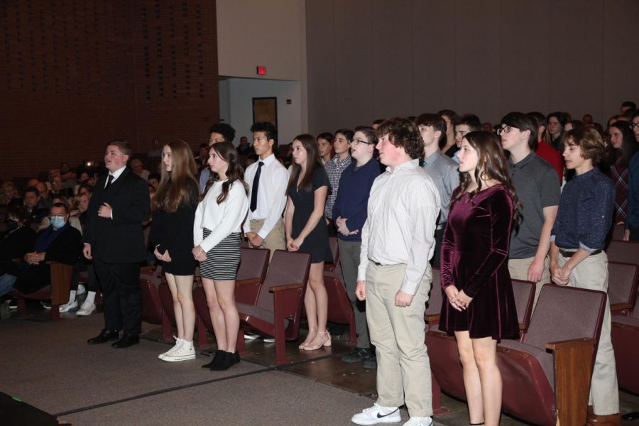 National Honor Society Inductees standing for the pledge. 