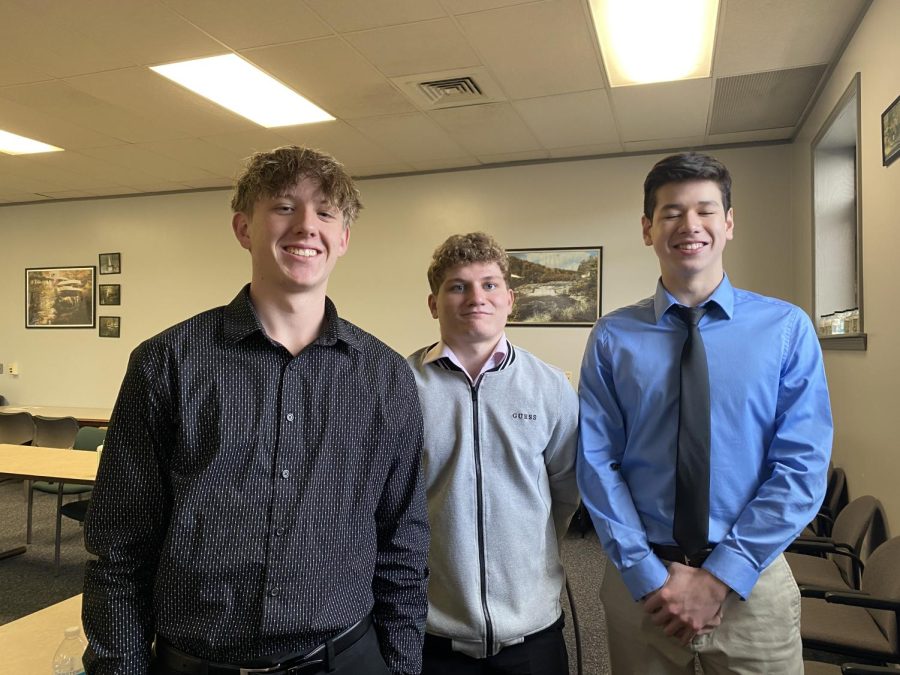 Seniors Caden Hoffman, Gabe Conboy, and Nicholas Cormas pose for a group picture prior to presenting their project. 