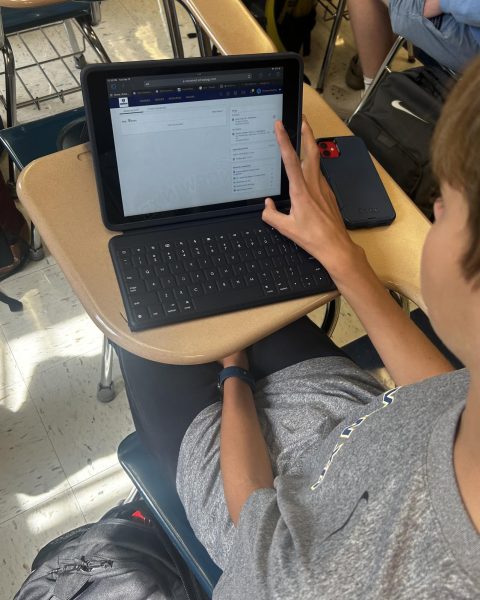 Thomas Gaydos (11) looks at some of his classes and upcoming assignments on Schoology. 