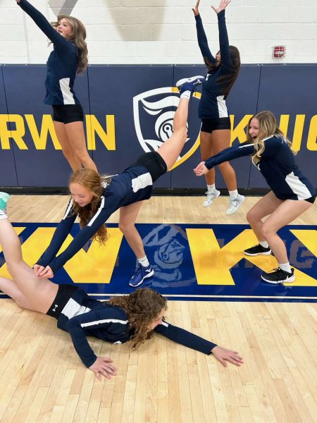 Some members of the Girls Volleyball team posing for a group photo. 