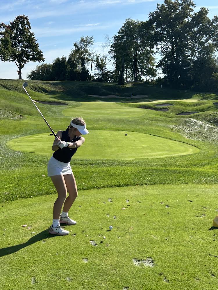 Sophomore Adalena Robb taking a swing during the 2023-24 girls golf season.  