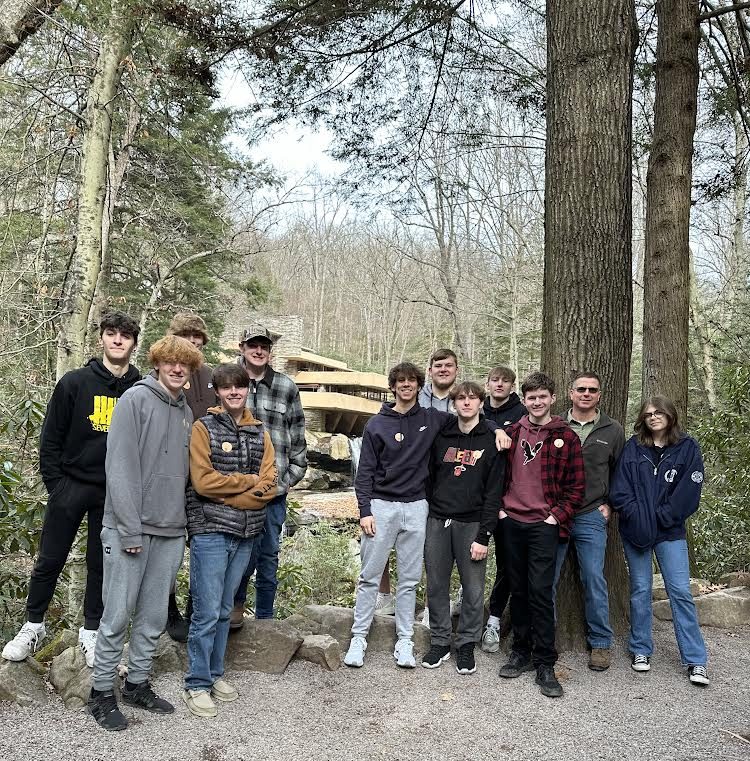 Norwin students stand in front of the Fallingwater house, designed by a renowned architect. 