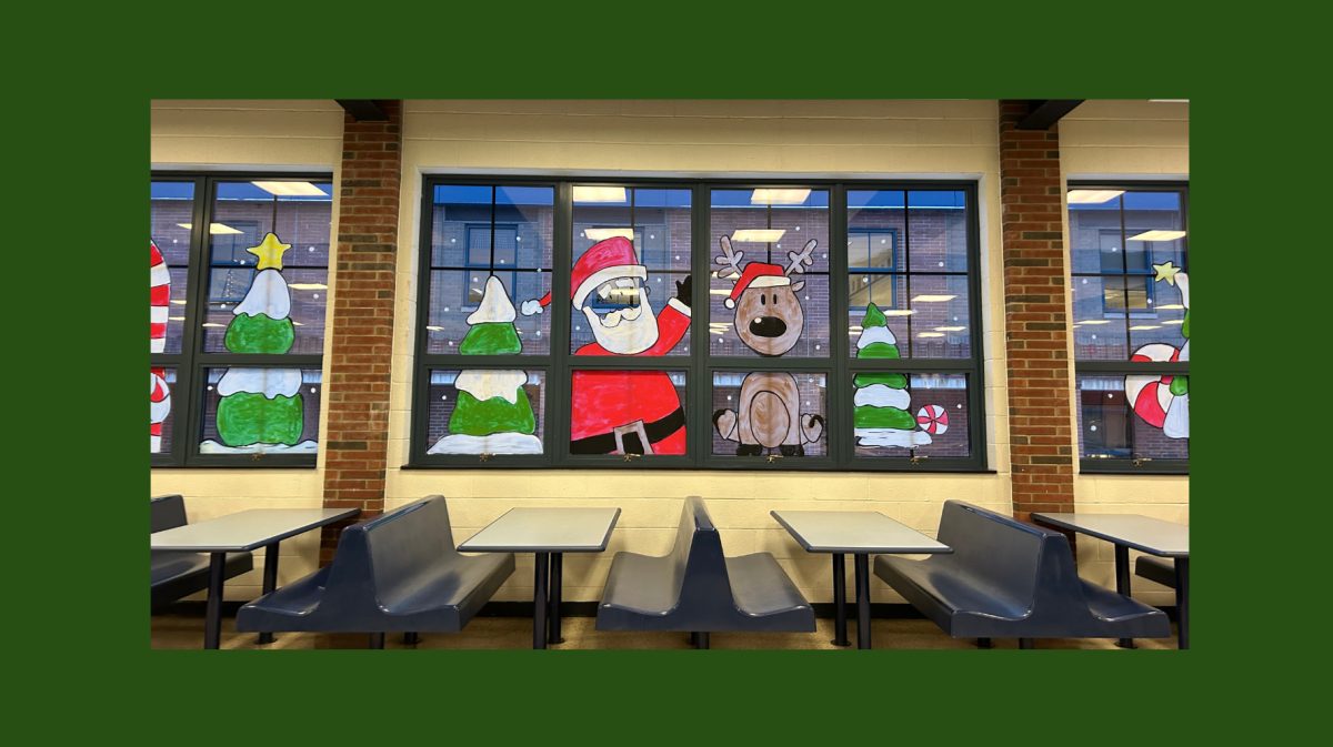 Cafeteria windows painted by the Art Club to celebrate Christmas. 