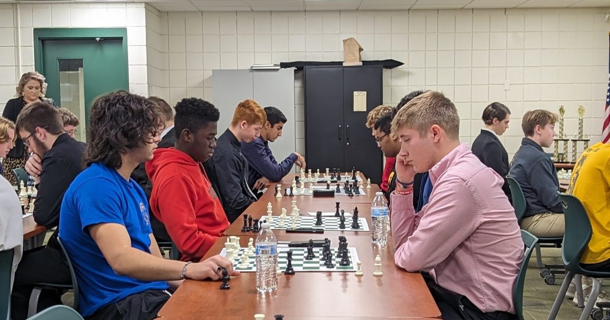 Penn Trafford students (left) played with the white pieces and Norwin students (right) played with the black pieces in one of the first rounds of the tournament. 