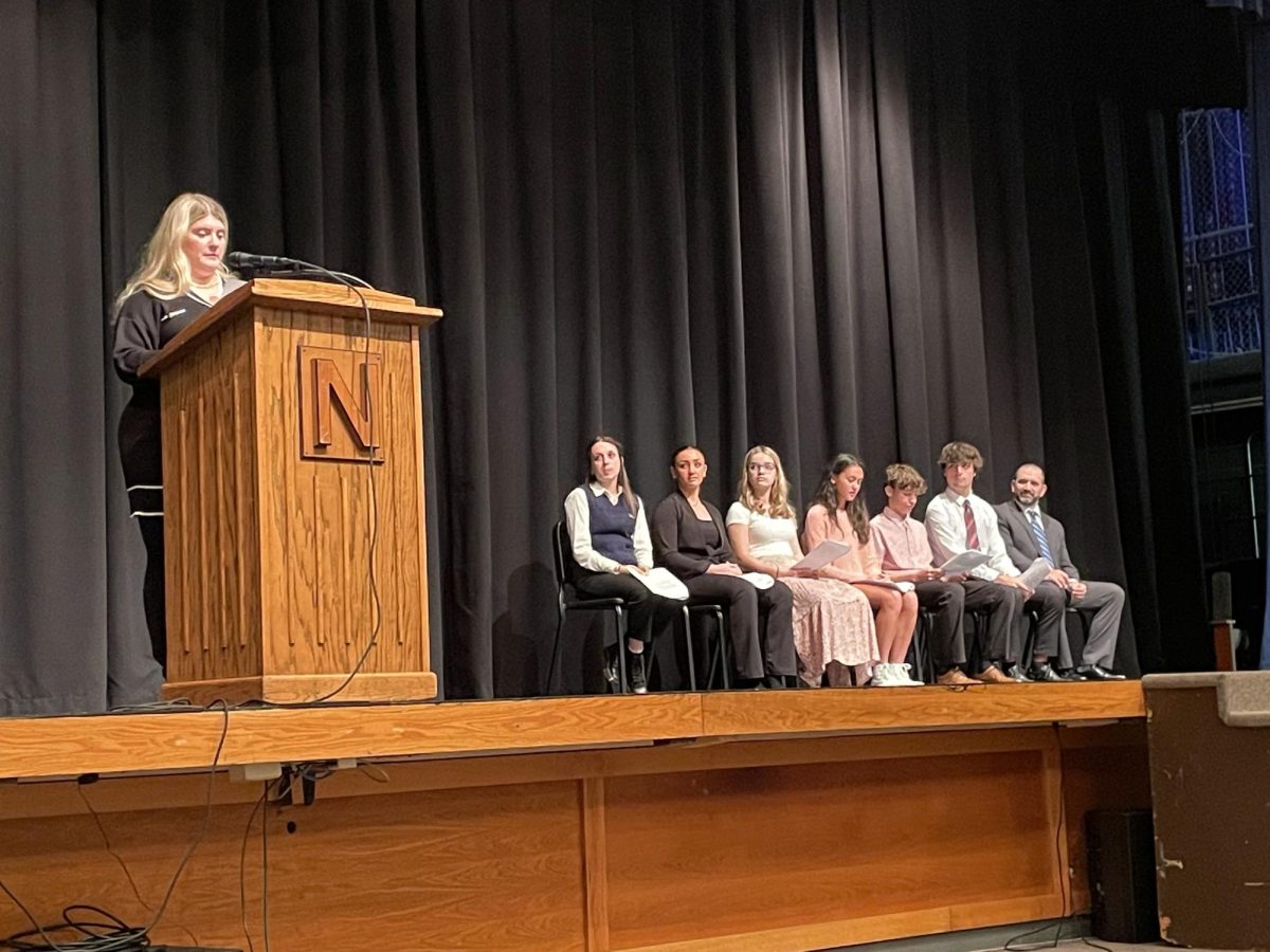 Guest speaker Ms. Allison Fedorka gives her speech at the NHS induction ceremony.