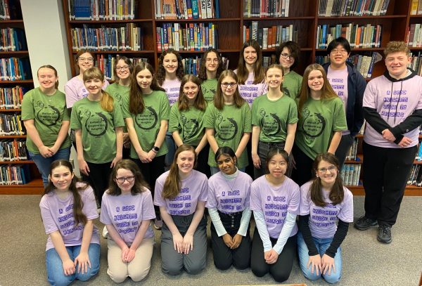The freshman and junior WIRC reading team (green shirts) and the sophomore and senior WIRC reading team (purple shirts) get ready for the competition at Seton Hill. 