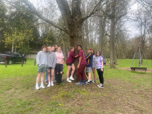 Norwin’s Envirothon teams pose by a tree after “Norwin 2” takes second in the competition and “Norwin 1” takes fourth overall. 