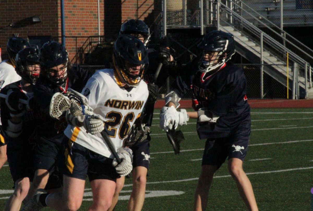 The Norwin High School Boys Lacrosse team playing against the Shaler Area Titans on March 25, 2024. 