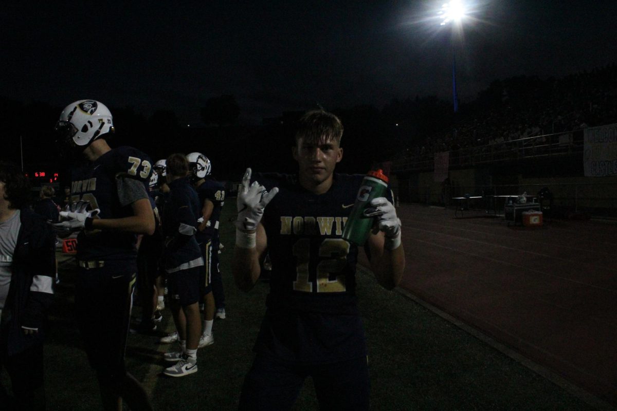 Junior wide receiver Jake Knight on the sideline after making a big play on the field.