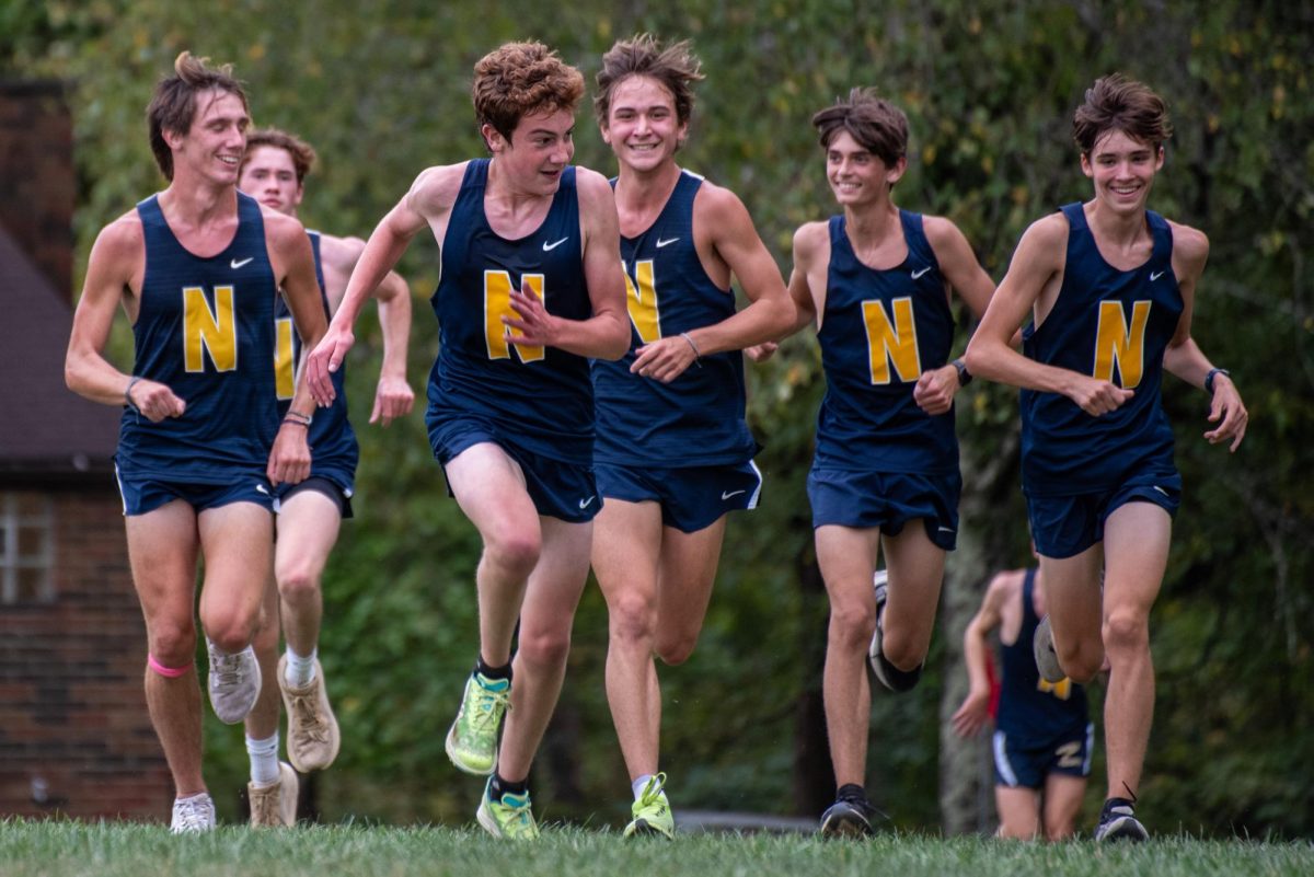 Luke Simpson (12), Owen Rankin (10), William Little (9), Enzo Jiancrisotoforo (12), Ben McBride (9), Thomas Gaydos (12) approach the finish line at Oak Hollow. The boys mix of young and old lead the Knights to early season success. 