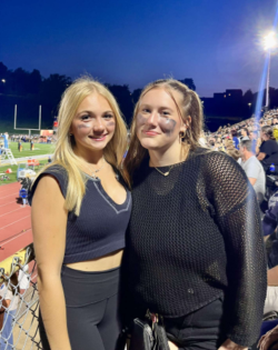 Serena Borrelli and Addison Baer pose together at a Norwin football game