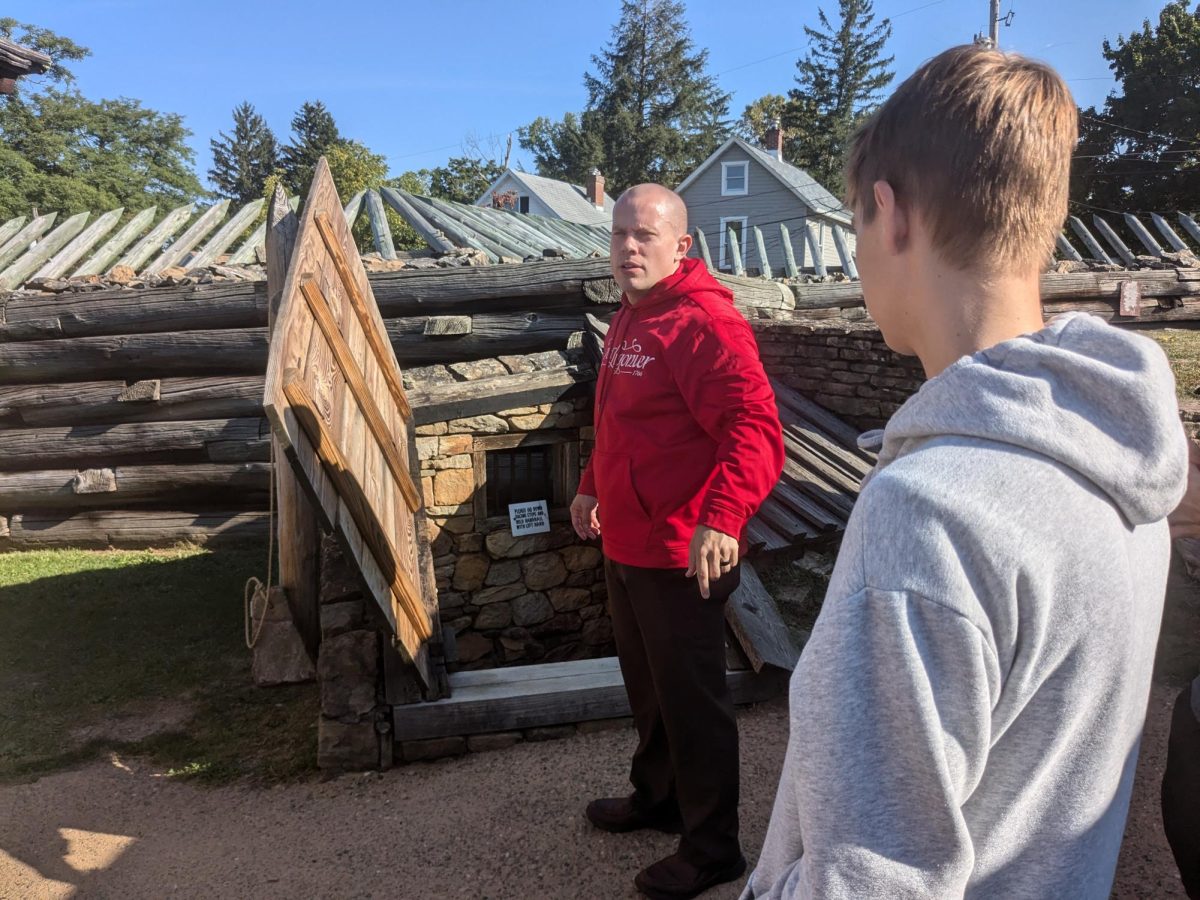 Tour guide explains the cellar used to protect the gunpowder from going off under siege.