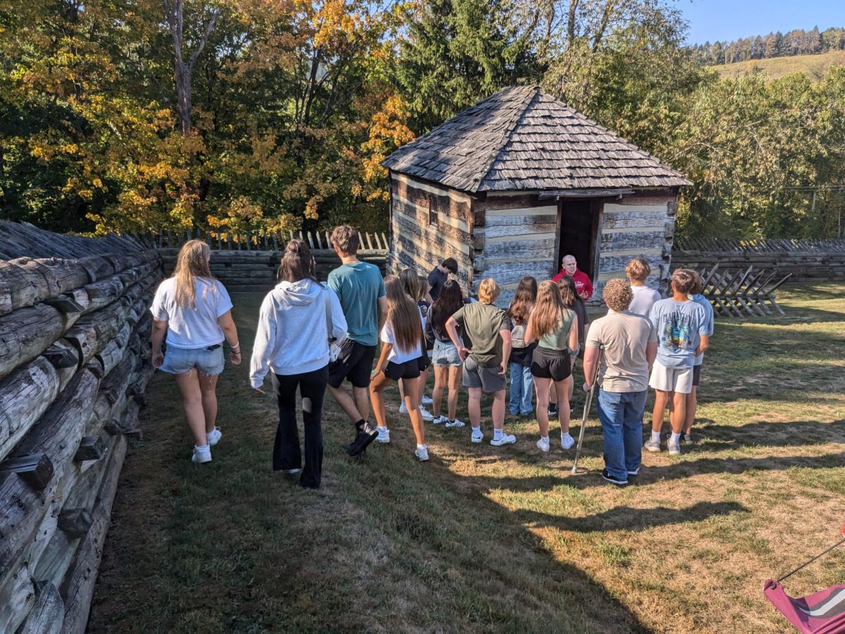 AP U.S. History students observe a recreation of general Forbes’ lodge as the tour guide explains the fort’s history.