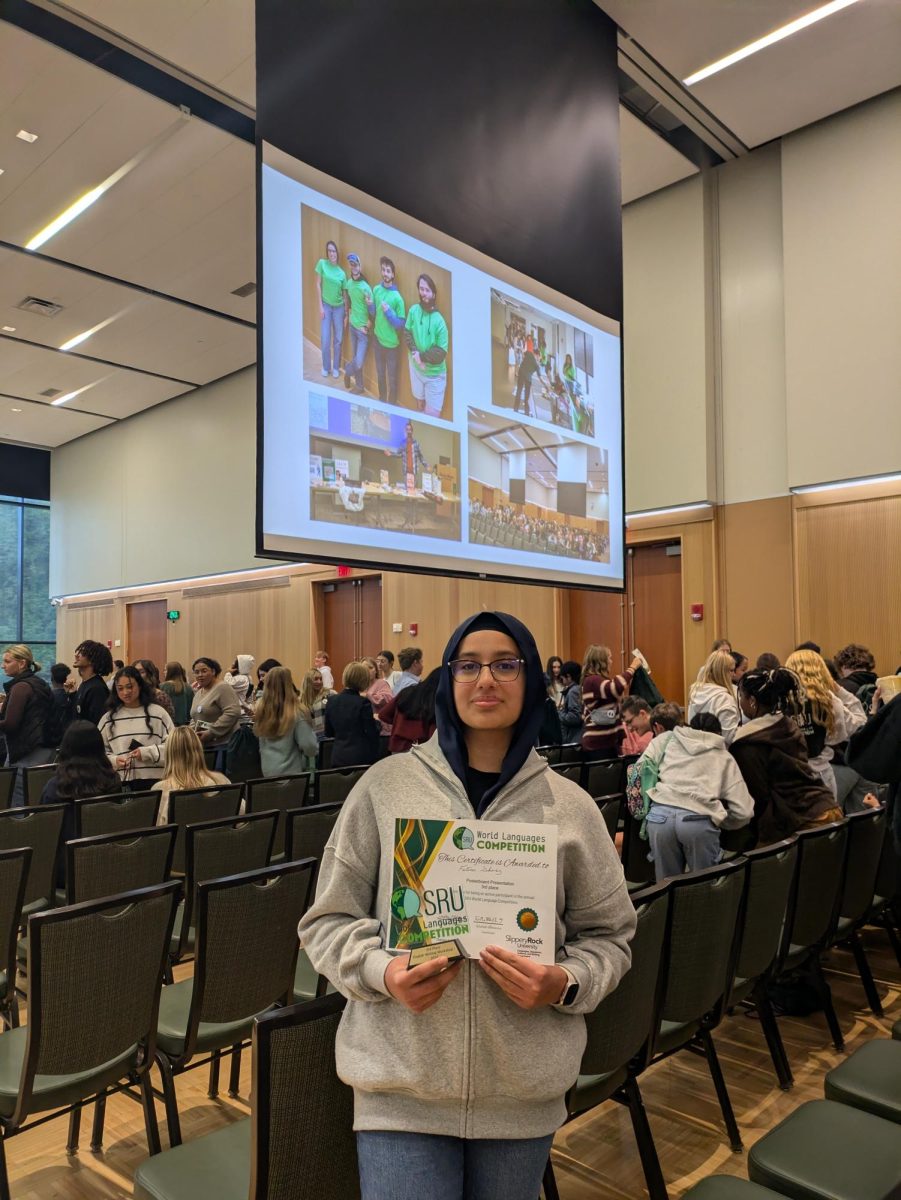 Sophomore Fatima Sheraz wins third place for her poster, “Why Teaching Culture is Important”