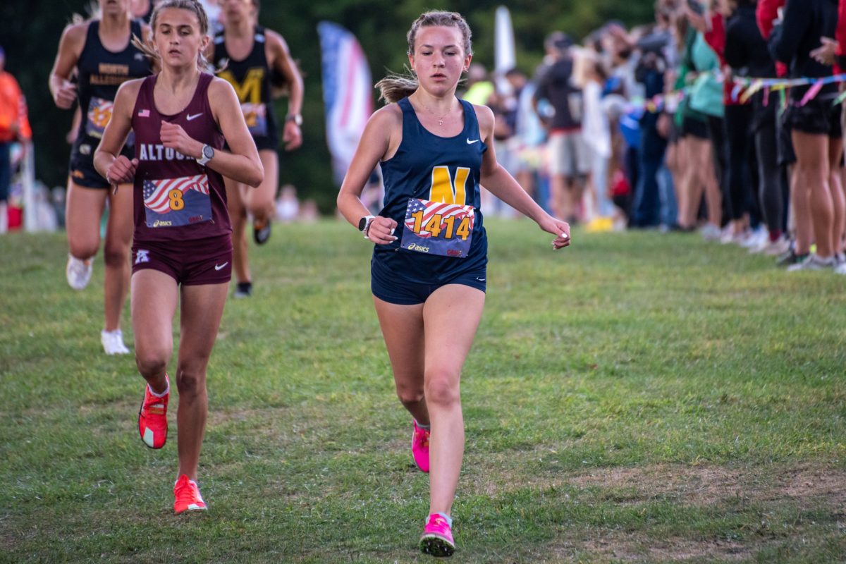 Emilee Schaeffer runs down the home stretch at Red, White, and Blue