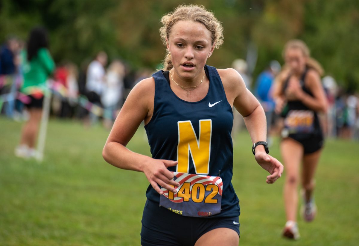 Anna Dansak runs down the chute at the Red, White, and Blue Invitational.