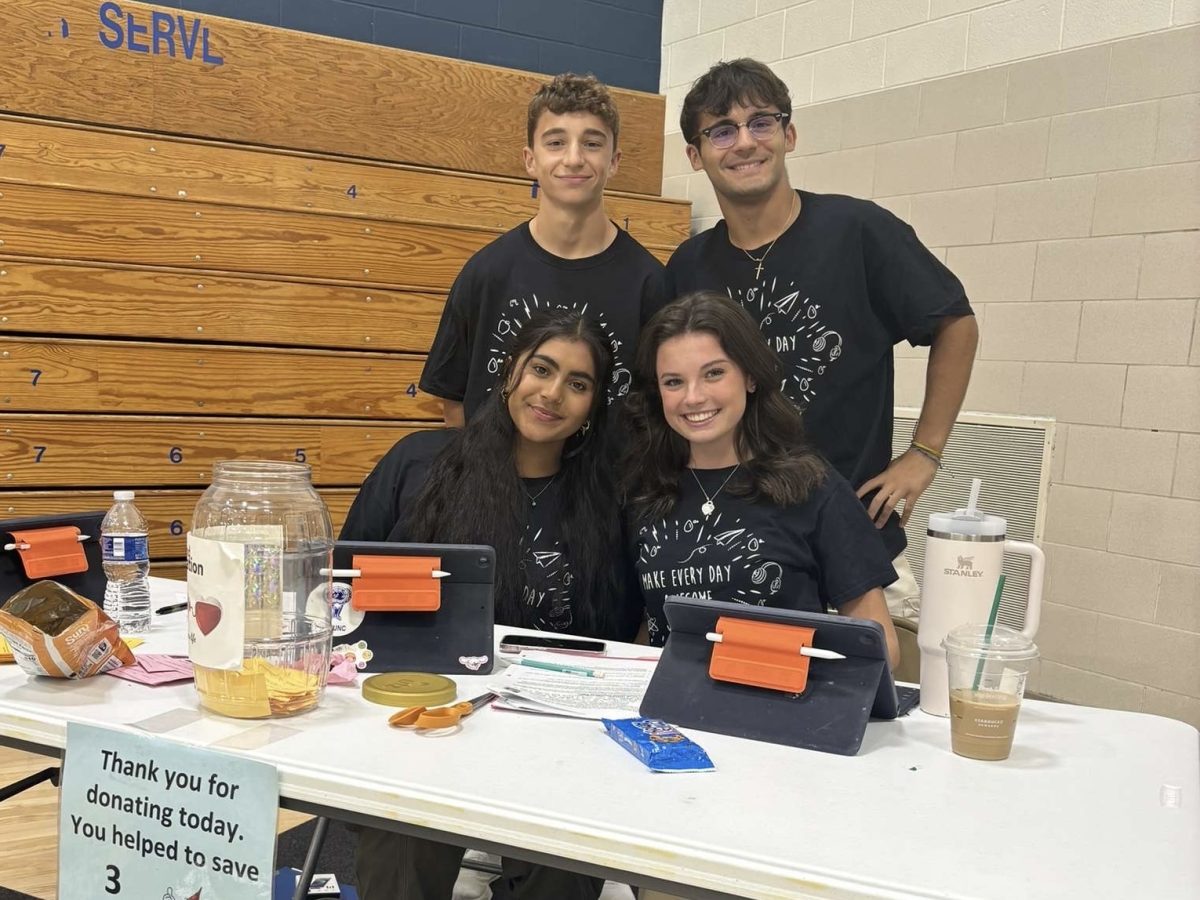 Class Officers Joey Brown, Joe Cramer, Harneet Singh, and Molly Geissler working at the blood drive