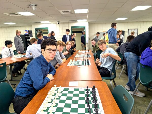 Aaron Goettler, Sean Stukus, CJ Elliot, Henry Peters, Isiah Ganster, and Tyler Davis pose for a picture at their Penn Trafford Chess tournament before their matches