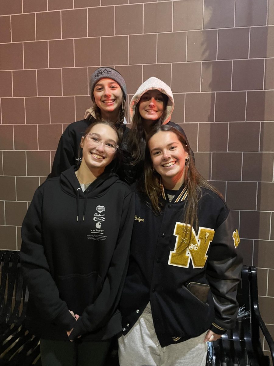 Carmella Lio (11), Maddy Bulger (11), Ashlynn Field (11) ,Sami garvi (11) posing for light up night 