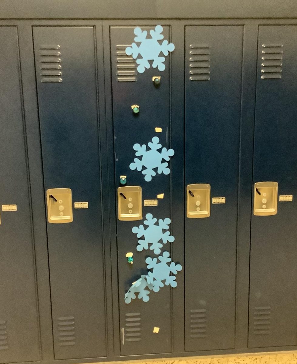 This locker was decorated in blue paper snowflakes.