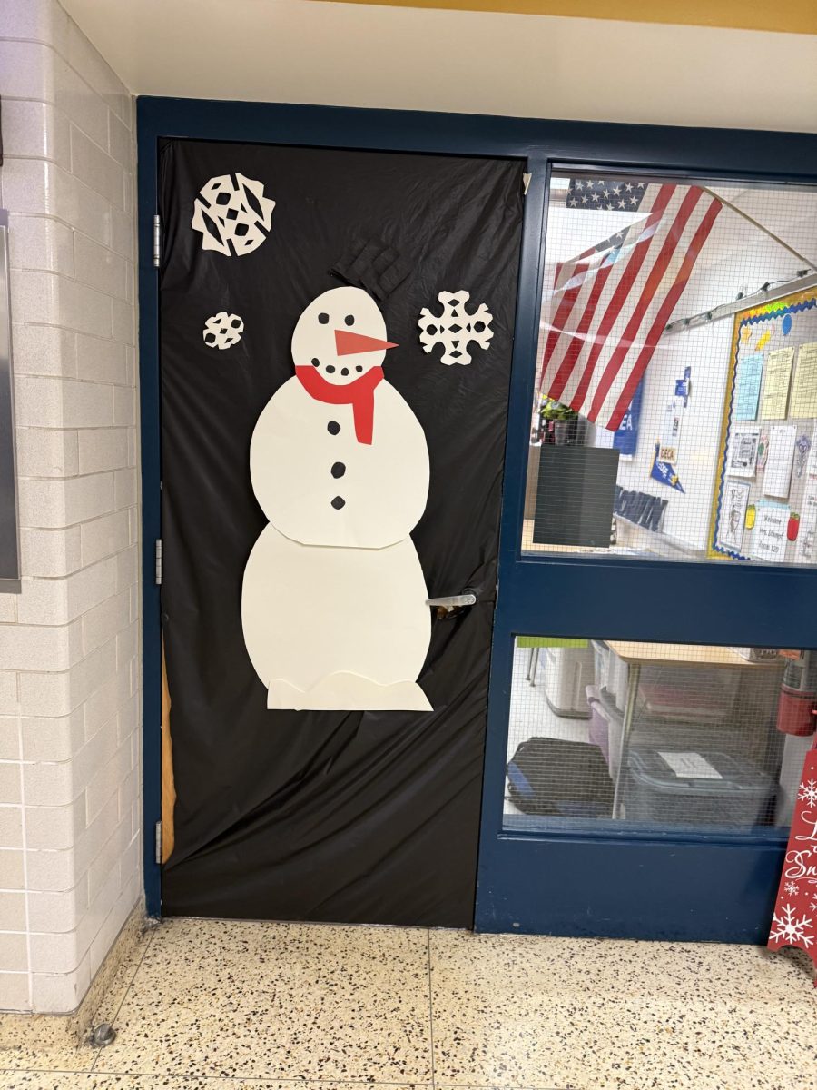 Room 120 had a snowman theme. The main colors used were black and white with the red accent color in the scarf.