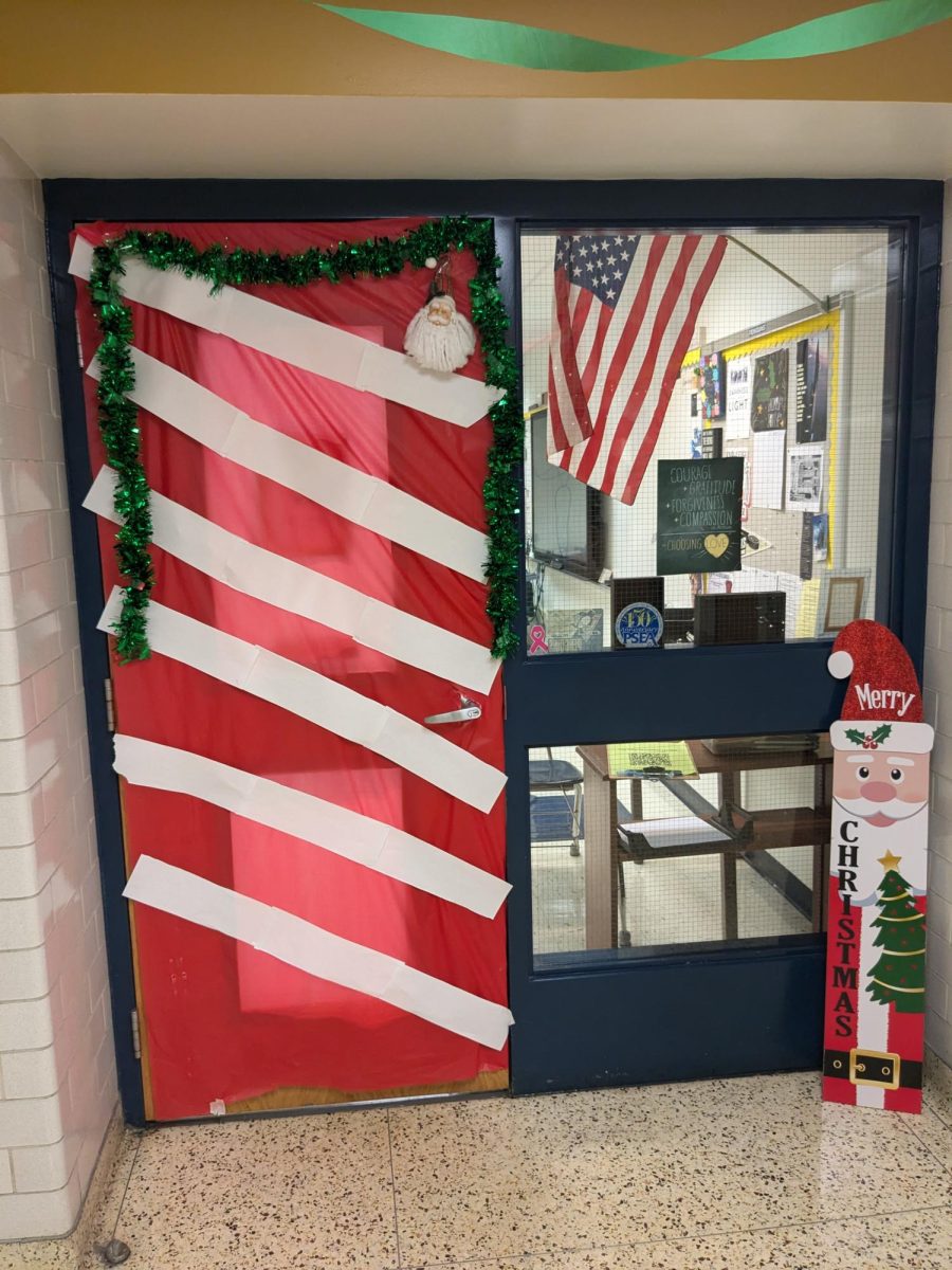 Room 216 had a Santa theme with a pattern similar to a candy cane. The main colors were red and white. 