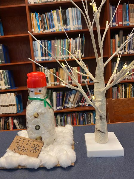 Jillian Ryba’s coffee creamer snowman was set up in the library before the holiday break. 