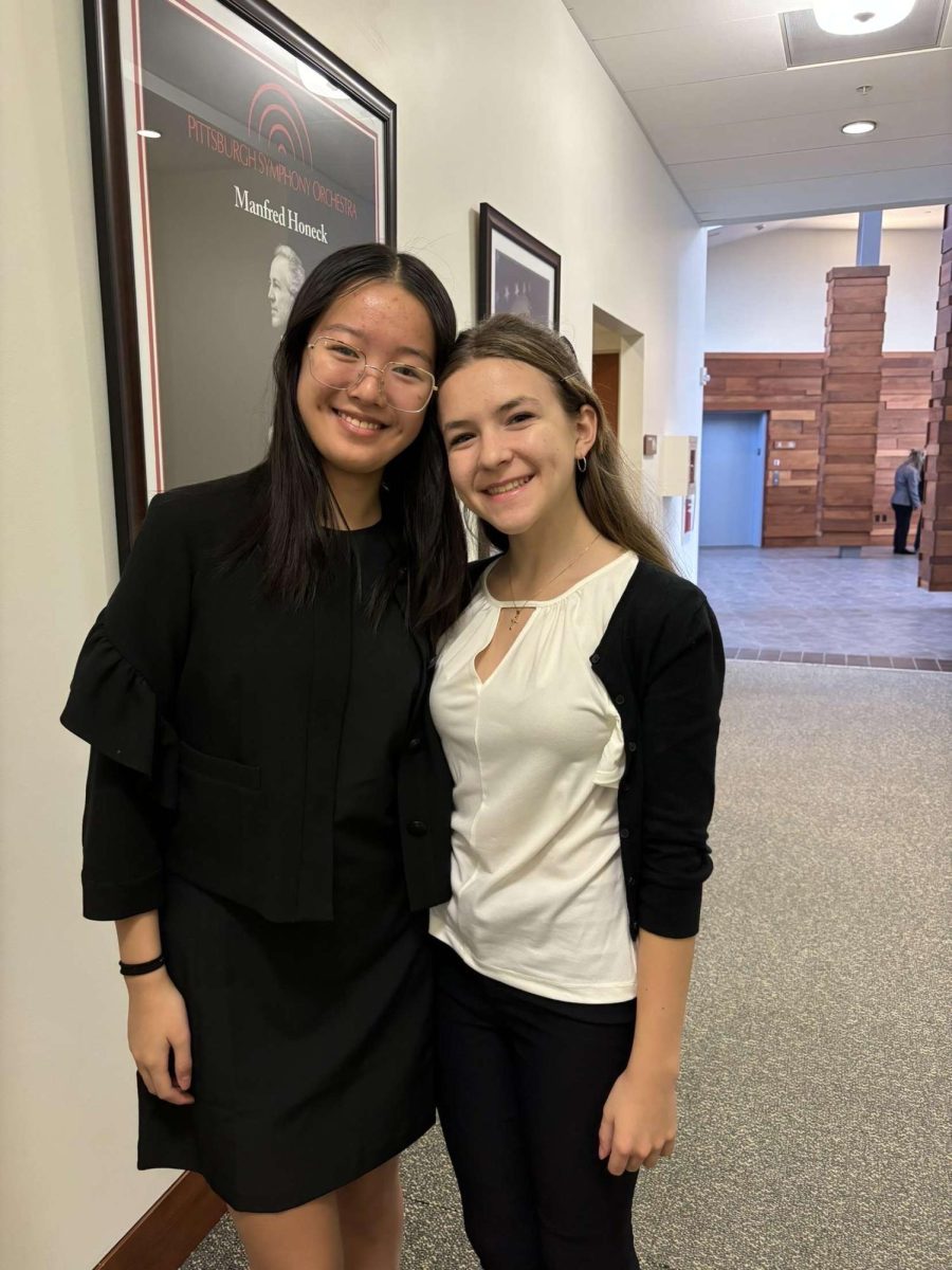 Freshman Jocelyn Cao and sophomore Jillian Ryba pose for a photo before the annual award ceremony at St. Vincent College. 