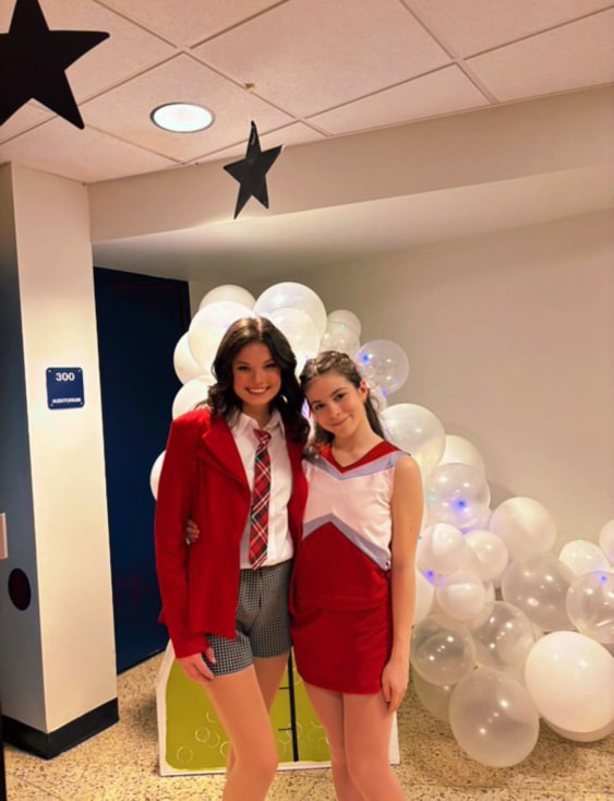 Featured actor/singer/dancer Malena DeJesus (freshman) and lead Molly Geissler as Taylor (senior)