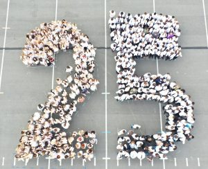 Seniors pose on the bandfield on last day of school to commemorate the class of '25.