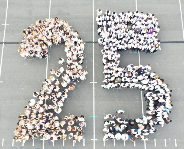 Seniors pose on the bandfield on last day of school to commemorate the class of '25.