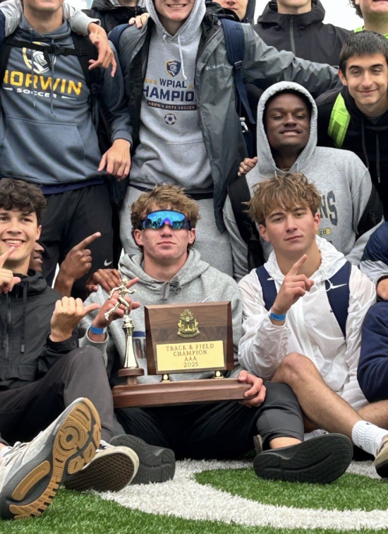 Ryan Schiller and his track and field teammates celebrate after ending their careers on a WPIAL title in 2025