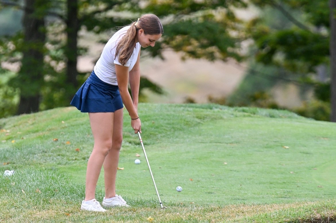 Sophomore Olivia Andrykovitch putts in a shot in match play. 