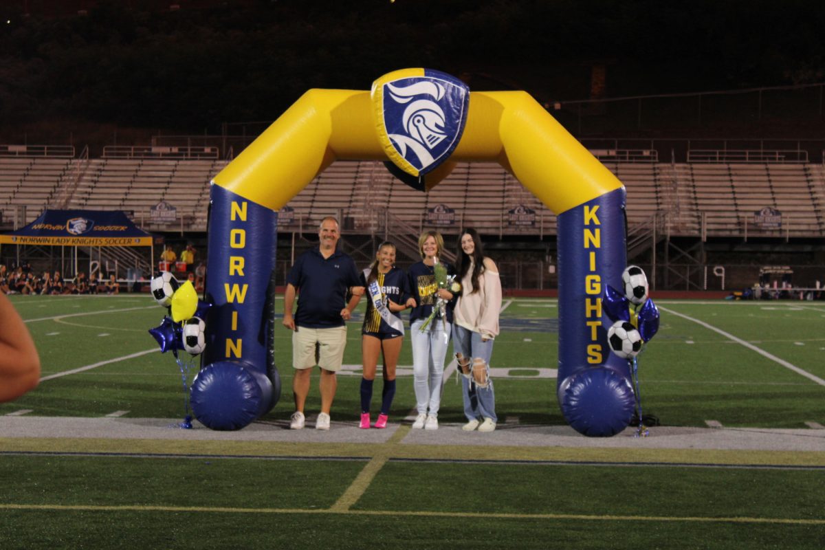 Senior, Alexa Kobus, and her family on senior night.