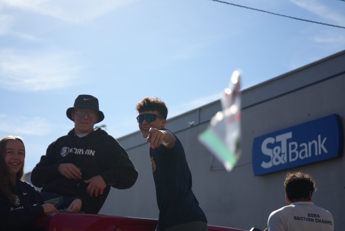 Track and Field runner Tyler Beck at the Homecoming parade