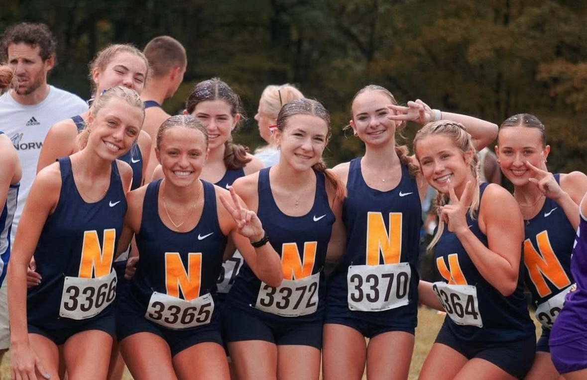 The Lady Knights pose before their race.